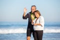 Portrait of aged couple spending freetime near sea Royalty Free Stock Photo