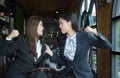 Portrait of Aggressive young Asian woman in formal wear or businesswoman fight/Coworkers fighting Royalty Free Stock Photo