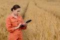 Portrait Agronomist farmer with digital tablet computer in wheat field Royalty Free Stock Photo