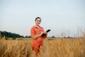Portrait Agronomist farmer with digital tablet computer in wheat field Royalty Free Stock Photo