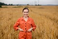 Portrait Agronomist farmer with digital tablet computer in wheat field