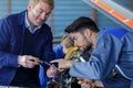 Portrait aircraft mechanics at work