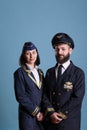 Portrait of airplane aviator and flight attendant