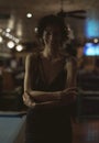 Portrait of alone woman at a bar Royalty Free Stock Photo