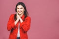 Portrait of amazed shocked young woman isolated over pink background Royalty Free Stock Photo