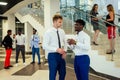 Portrait of ambitious business team diverse ethnicity multinational people in stylish suit getting communicating Royalty Free Stock Photo