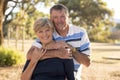 Portrait of American senior beautiful and happy mature couple around 70 years old showing love and affection smiling together in t Royalty Free Stock Photo