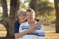 Portrait of American senior beautiful and happy mature couple around 70 years old showing love and affection smiling together in t Royalty Free Stock Photo