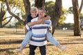 Portrait of American senior beautiful and happy mature couple around 70 years old showing love and affection smiling together in t Royalty Free Stock Photo