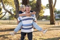 Portrait of American senior beautiful and happy mature couple around 70 years old showing love and affection smiling together in t Royalty Free Stock Photo