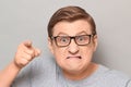 Portrait of angry annoyed man with pointing with index finger at you Royalty Free Stock Photo