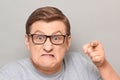 Portrait of angry annoyed man with pointing with index finger at you Royalty Free Stock Photo