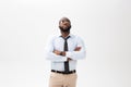 Portrait of angry or annoyed young African American man in white polo shirt looking at the camera with displeased Royalty Free Stock Photo