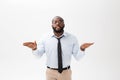 Portrait of angry or annoyed young African American man in white polo shirt looking at the camera with displeased Royalty Free Stock Photo