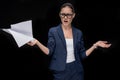 Portrait of angry asian businesswoman holding documents Royalty Free Stock Photo