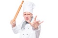 portrait of an angry chef with a wooden rolling pin Royalty Free Stock Photo