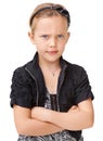 Portrait, angry and children with an unhappy girl standing arms crossed in studio isolated on a white background. Kids Royalty Free Stock Photo