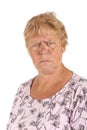 Portrait angry senior woman on white background