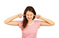 Portrait of angry stressed out young woman plugging ears with fingers and closing eyes tight. emotional girl isolated on white bac Royalty Free Stock Photo