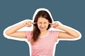 Portrait of angry stressed out young woman plugging ears with fingers and closing eyes tight. emotional girl Magazine collage Royalty Free Stock Photo