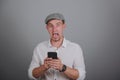 portrait of angry young man shouting using mobile Royalty Free Stock Photo
