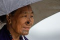 The portrait of Apatani women with her nose plug.