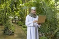 Portrait of Arab muslim business man dress in white thobe with p Royalty Free Stock Photo