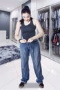 Arabian woman wearing her old jeans at home Royalty Free Stock Photo