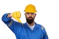 Portrait architect builder in transparent safety glasses. Bearded man worker in hard hat with angry face showing dislike