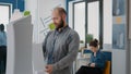 Portrait of architect holding building model to create architectural project and structure Royalty Free Stock Photo