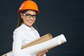 Portrait of architect student woman with blueprints Royalty Free Stock Photo