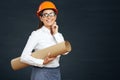 Portrait of architect student woman with blueprints Royalty Free Stock Photo