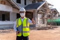 Portrait of Architect wearing a mask on a building construction site, Homebuilding Ideas and Prevention of Coronavirus Disease Royalty Free Stock Photo