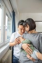 Portrait of asain family in living room