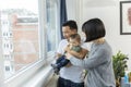 Portrait of asain family in living room