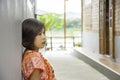 Portrait of Asean woman wearing a native of northern Thailand background wooden wall