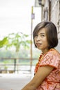 Portrait of Asean woman wearing a native of northern Thailand background wooden wall