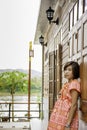 Portrait of Asean woman wearing a native of northern Thailand background wooden wall