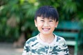 Portrait of Asia kid boy smiling with teeth and gums. Royalty Free Stock Photo