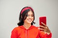 Portrait of asian adult student university beautiful girl using her smartphone Selfie Royalty Free Stock Photo