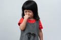 Portrait of Asian angry, sad and cry little girl on white isolated background, The emotion of a child when tantrum and mad, Royalty Free Stock Photo