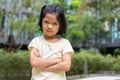 Portrait of an Asian angry and sad little girl. The emotion of a child when tantrum and mad, expression of grumpy emotion. Kid Royalty Free Stock Photo