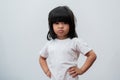 Portrait of Asian angry and sad little girl on white isolated background, The emotion of a child when tantrum and mad, expression Royalty Free Stock Photo