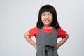 Portrait of Asian angry and sad little girl on white isolated background, The emotion of a child when tantrum and mad, expression Royalty Free Stock Photo