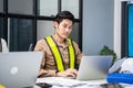 Portrait of Asian attractive young businessman typing on keyboard working in office. Male worker communication on laptop for onlin Royalty Free Stock Photo