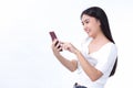 Portrait of asian beautiful woman Use the mobile phone happily on a white background Royalty Free Stock Photo