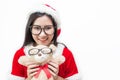 Portrait of asian beautiful woman wearing santa custume and glasses holding teddy bear