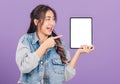 Woman confident smiling show blank screen with tablet computer and pointing Royalty Free Stock Photo