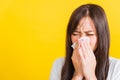 Woman sneezing sinus using towel to wipe snot from nose Royalty Free Stock Photo