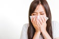 Woman sneezing sinus using towel to wipe snot from nose Royalty Free Stock Photo